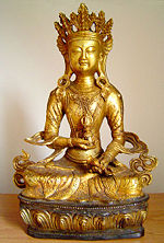 Vajrasattva holds the vajra in his right hand and a bell in his left hand.